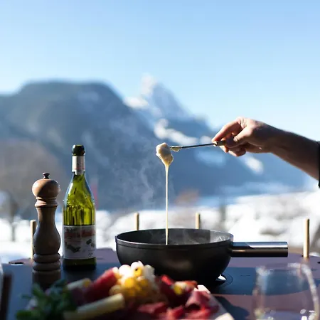 ホテル Huus Gstaad